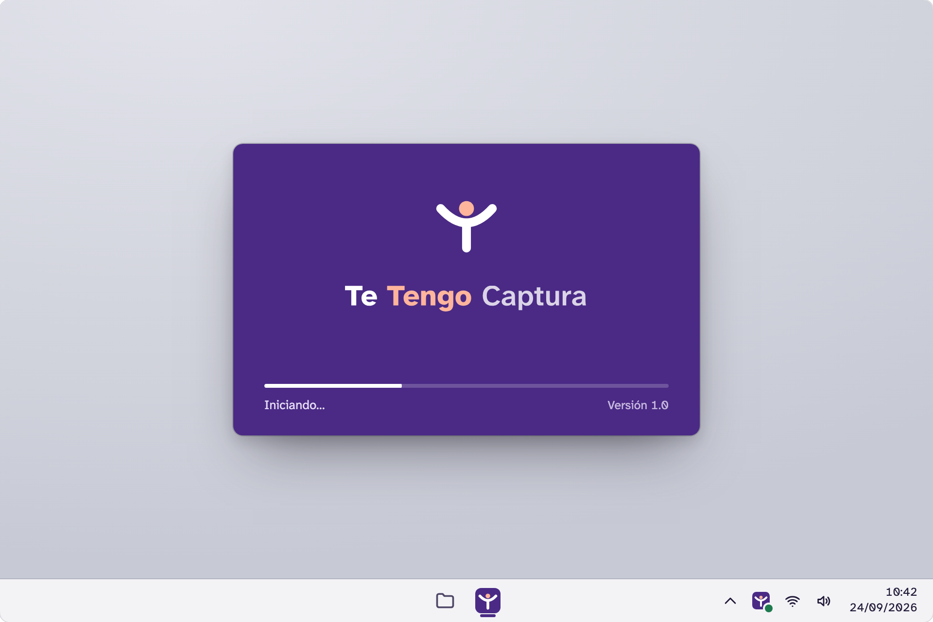 Ventana de arranque morada con el símbolo, «Te Tengo Captura» y una barra de progreso.